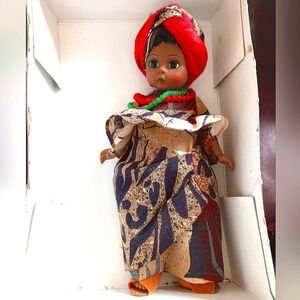 AFRICAN GIRL DRESSED IN TRADITIONAL CLOTHES, BY MADAME ALEXANDER, 7" TALL
